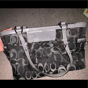 Medium sized black coach bag